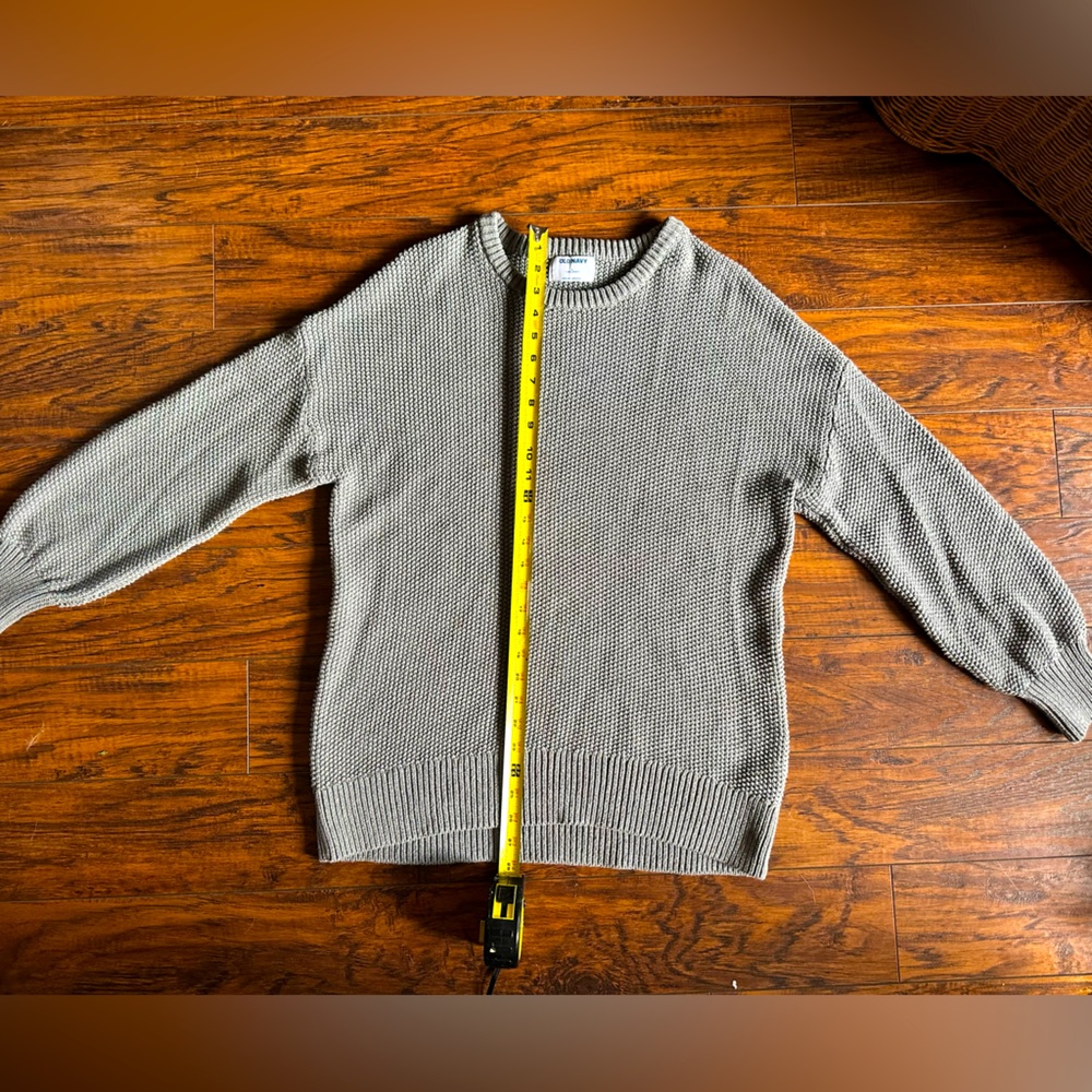 Medium to dark grey sweater, soft. Gently used once.